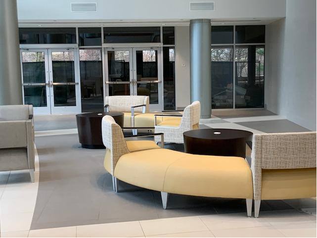 Doylestown Hospital waiting area with curved yellow bench seating