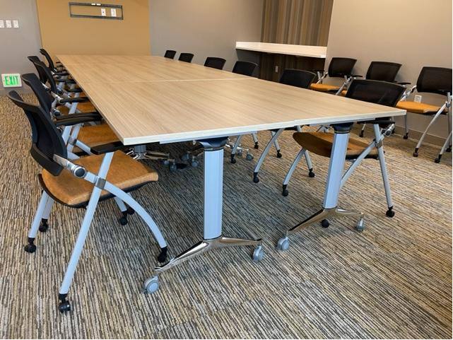 MossRehab training room with mobile flip-top tables and nesting chairs